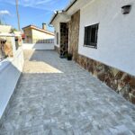 Terraza con estilo rústico y funcional en Sant Cugat